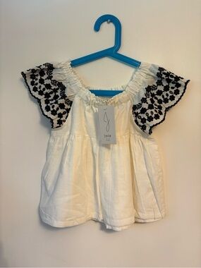 JOIE | White Top with Black Floral Eyelet Sleeves